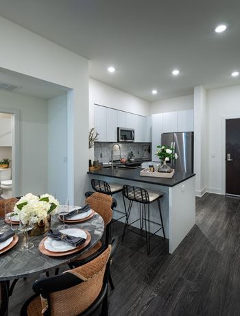Fully-equipped residents' catering kitchen with breakfast bar